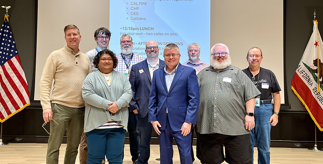 Left to right: Lothar Petrik, Nick Santos, Carmen Gonsalves, Michael Andrade, Blaine Wasylkiw, Jared Johnson, Louie Rowley, Mark Tyler, and Eric Anderson.