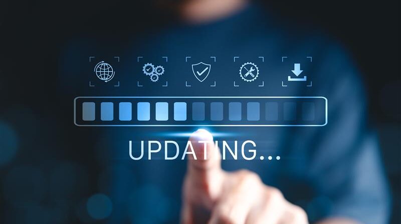 hand pointing at an updating message scale bar