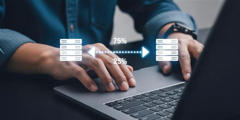 hands on a laptop performing recovery; double arrow transfer between two servers.